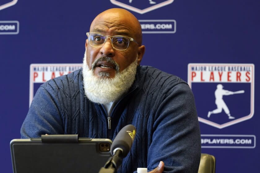 Major League Baseball Players Association Executive Director Tony Clark answers a question at a press conference