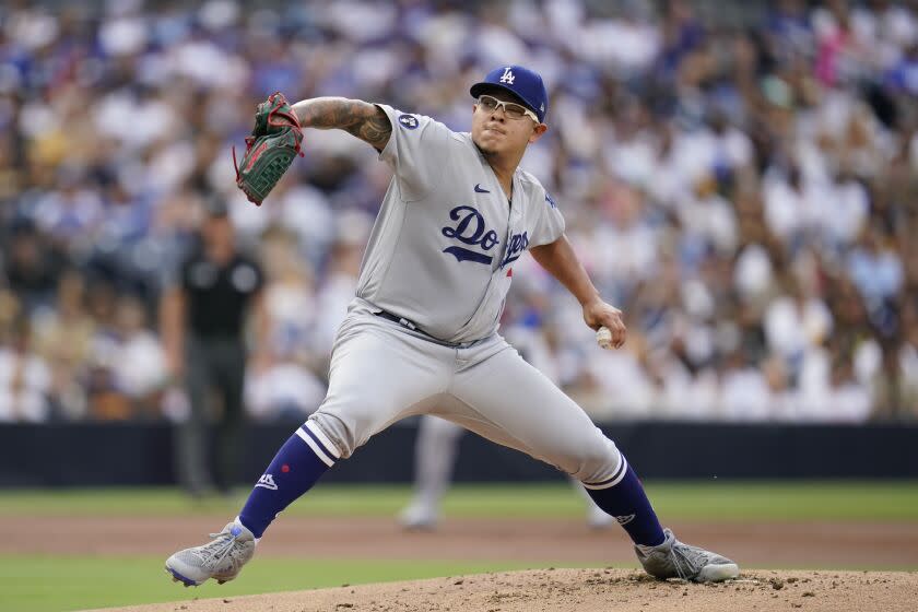 Los Angeles Dodgers starting pitcher Julio Urias works against a San Diego Padres.