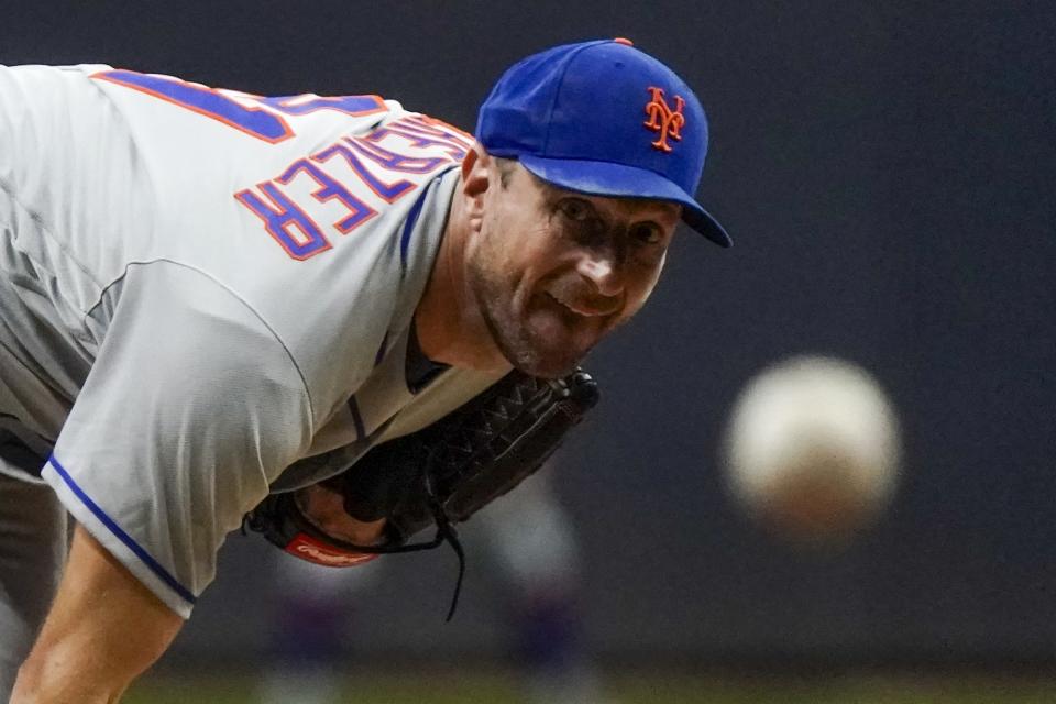 New York Mets starter Max Scherzer throws during the sixth inning of a baseball game against the Milwaukee Brewers Monday, Sept. 19, 2022, in Milwaukee. (AP Photo/Morry Gash)