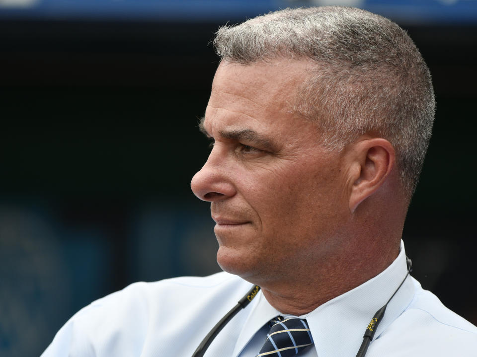 KANSAS CITY, MO - JUNE 12: Dayton Moore general manager of the Kansas City Royals watches batting practice prior to a game against the Cincinnati Reds at Kauffman Stadium on June 12, 2018 in Kansas City, Missouri. (Photo by Ed Zurga/Getty Images)