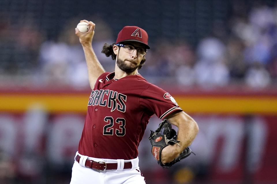 Arizona Diamondbacks starting pitcher Zac Gallen throws a pitch against the Milwaukee Brewers during the first inning of a baseball game Sunday, Sept. 4, 2022, in Phoenix. (AP Photo/Ross D. Franklin)