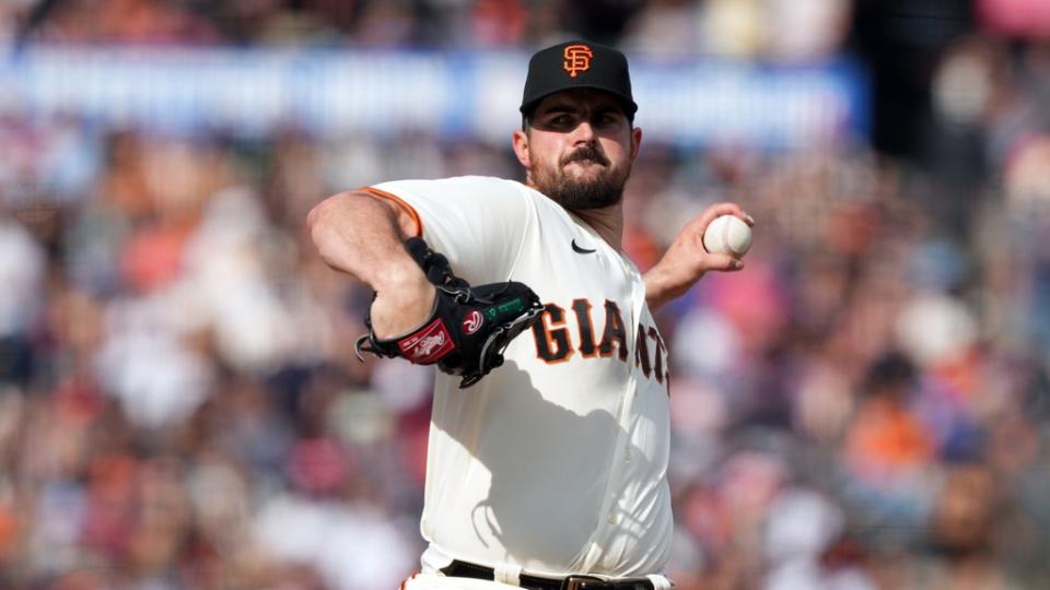 San Francisco Giants starting pitcher Carlos Rodon (16) throws a pitch against the Chicago Cubs during the fourth inning at Oracle Park.