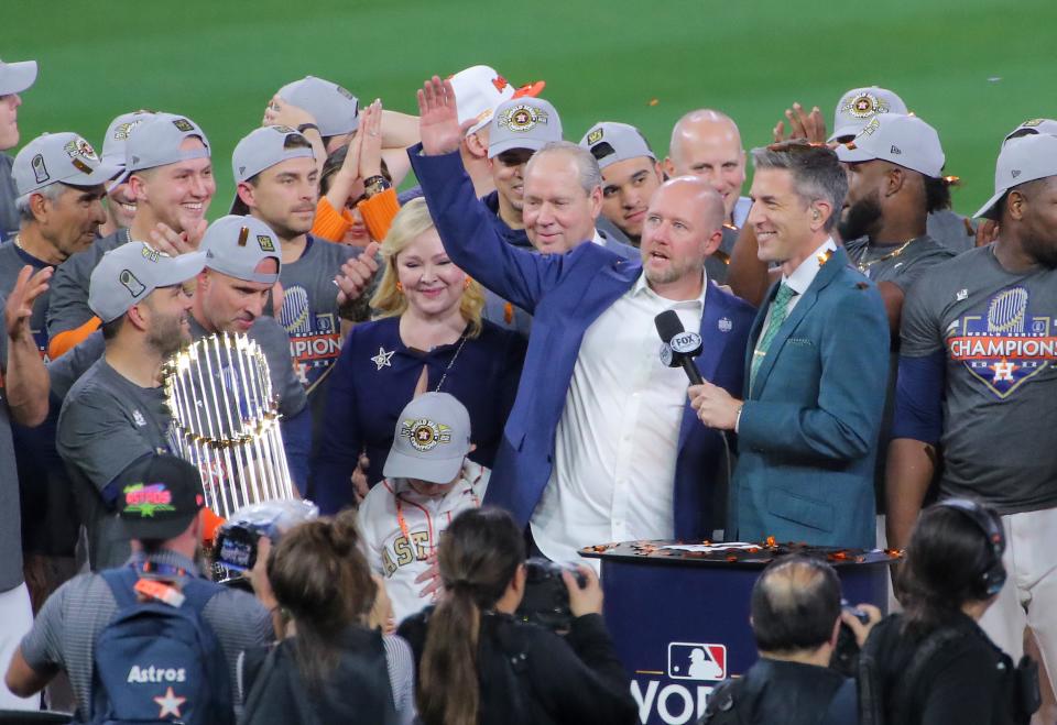 Astros general manager James Click addresses the crowd after Houston won the World Series.