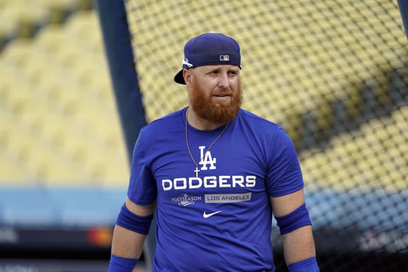 Los Angeles Dodgers' Justin Turner takes batting practice.