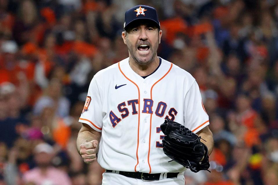 Astros starting pitcher Justin Verlander celebrates after recording a strikeout during the sixth inning of Game 1 in the American League Championship Series at Minute Maid Park in Houston on Oct. 19, 2022.