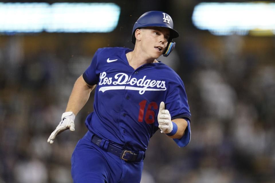 Los Angeles Dodgers' Will Smith (16) runs to third on a triple during the fourth inning.