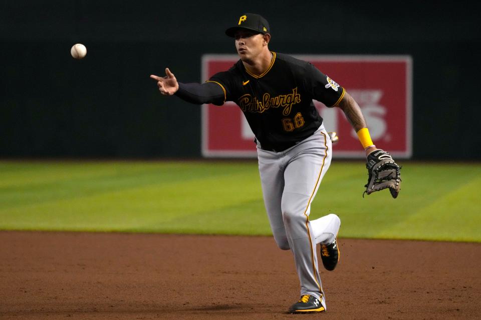 Aug 8, 2022; Phoenix, Arizona, USA; Pittsburgh Pirates right fielder Bligh Madris (66) flips the ball for an out against the Arizona Diamondbacks in the second inning at Chase Field.