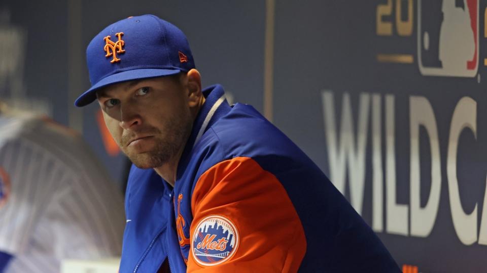 New York Mets starting pitcher Jacob deGrom sits in the dug out before game two of the Wild Card series against the San Diego Padres for the 2022 MLB Playoffs.