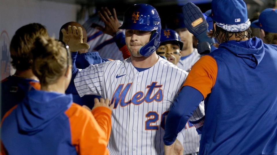 Sep 27, 2022; New York City, New York, USA; New York Mets first baseman Pete Alonso (20) celebrates his three run home run against the Miami Marlins in the dugout with teammates during the fourth inning at Citi Field.