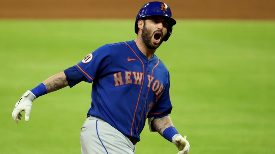 May 18, 2021; Atlanta, Georgia, USA; New York Mets catcher Tomas Nido (3) reacts after hitting a solo home run during the ninth inning against the Atlanta Braves at Truist Park.