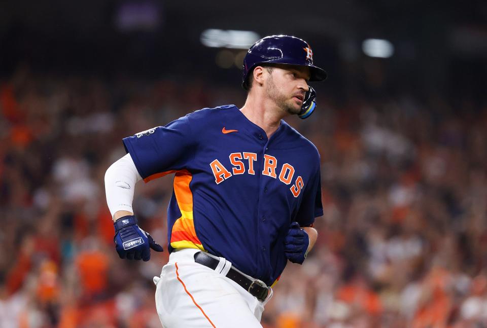 Trey Mancini hits a single in Game 6 of the 2022 World Series against the Phillies. Mancini played five seasons in Baltimore before being acquired by the Astros at last year's trade deadline.