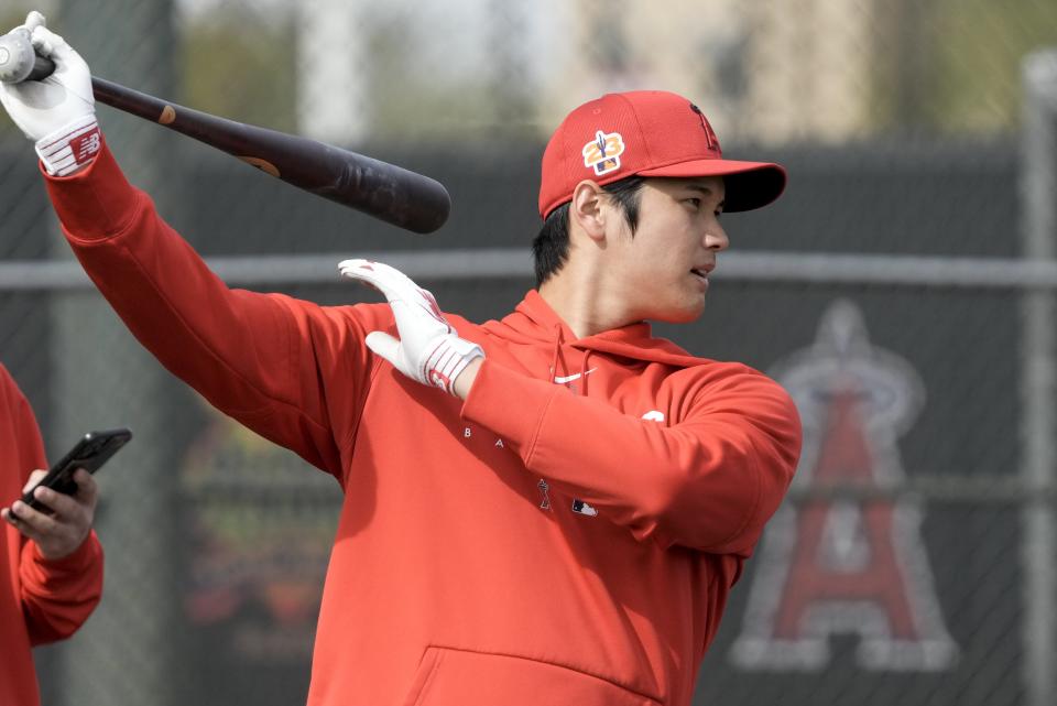 Shohei Ohtani bats during a spring training workout Friday in Phoenix. (AP Photo/Morry Gash)