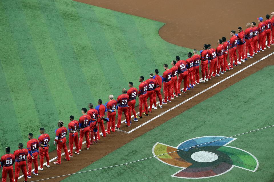 Team Cuba stands for the national anthem prior to the World Baseball Classic Semifinals against Team USA at loanDepot park on March 19, 2023 in Miami, Florida.