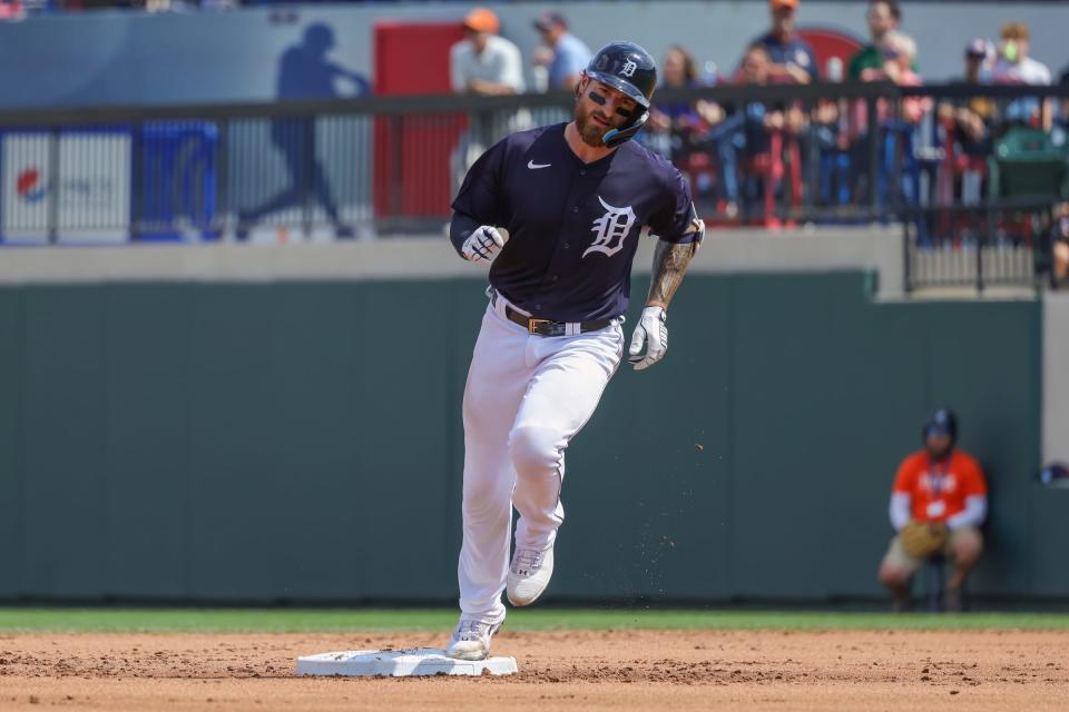 Detroit Tigers catcher Eric Haase (13) rounds second on a home run during the second inning against the New York Yankees at Publix Field at Joker Marchant Stadium in Lakeland, Florida, on Friday, March 10, 2023.