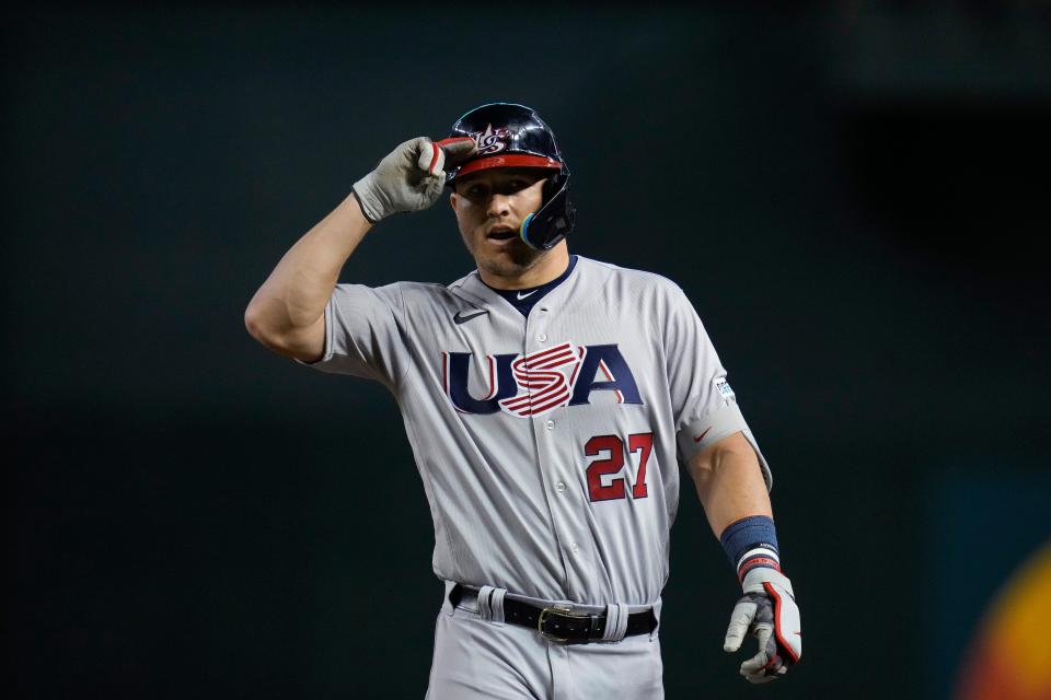 Mike Trout reacts after hitting an RBI single against Colombia in  the third inning of a World Baseball Classic game in Phoenix.