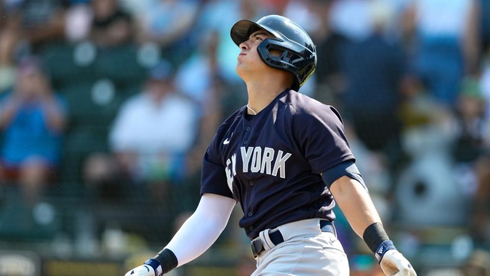 Mar 2, 2023; Bradenton, Florida, USA; New York Yankees second baseman (77) hits a home run against the Pittsburgh Pirates in the first inning during spring training at LECOM Park.