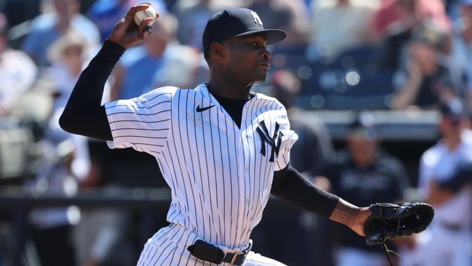 Mar 1, 2023; Tampa, Florida, USA; New York Yankees starting pitcher Domingo German (0) throws a pitch during the first inning against the Washington Nationals at George M. Steinbrenner Field.
