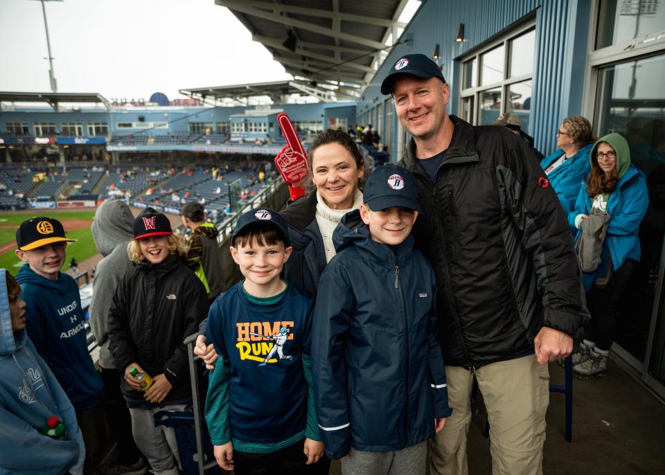 Melissa and Matt Gingras of Hubbardston, along with their sons Andy and Nate were honored on Sunday for being the 1,000,00th fan to attend a game at Polar Park.