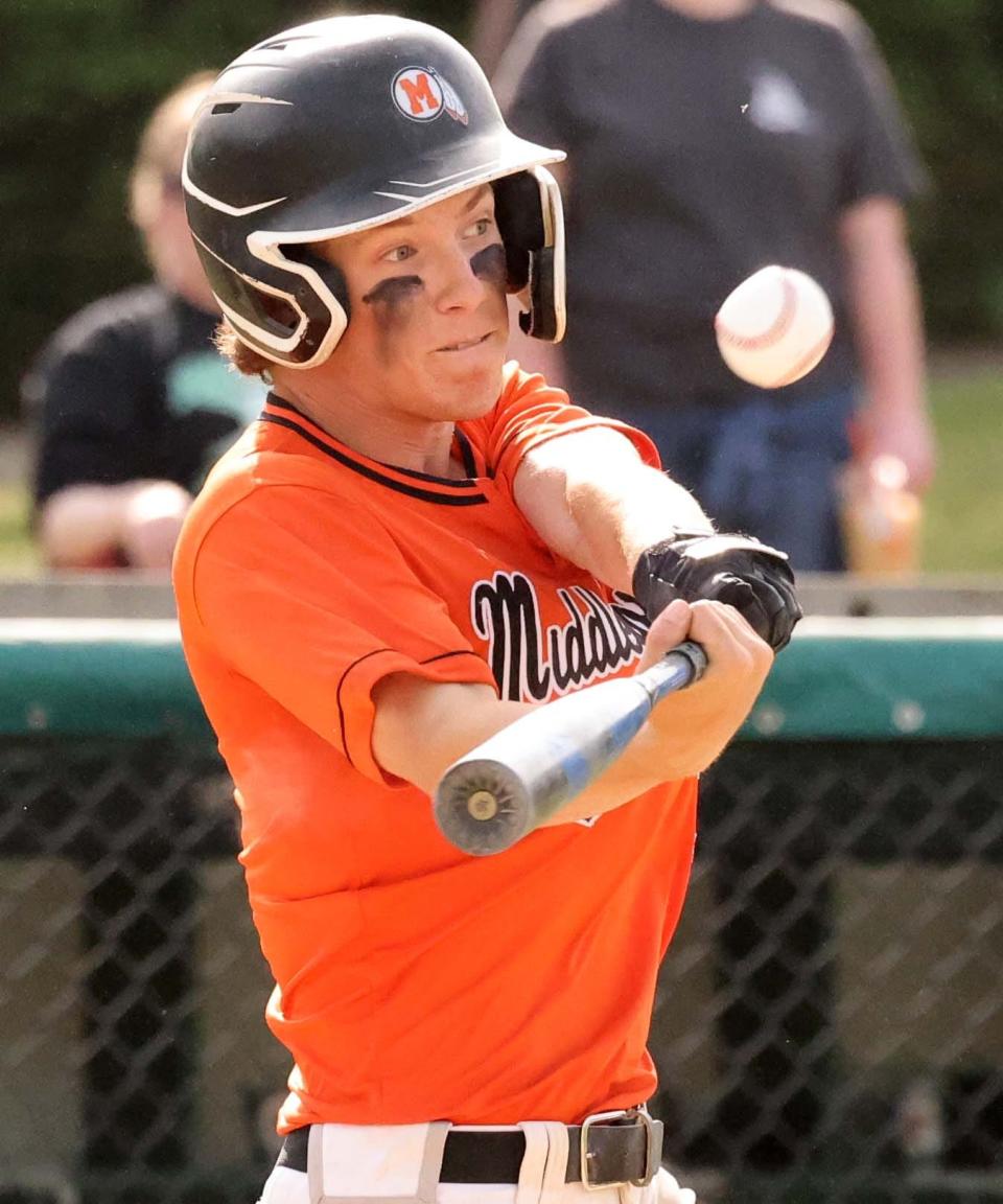 Middleboro batter Nate Tullish hits a triple on this swing during a game versus Abington on Tuesday, May 16, 2023. 