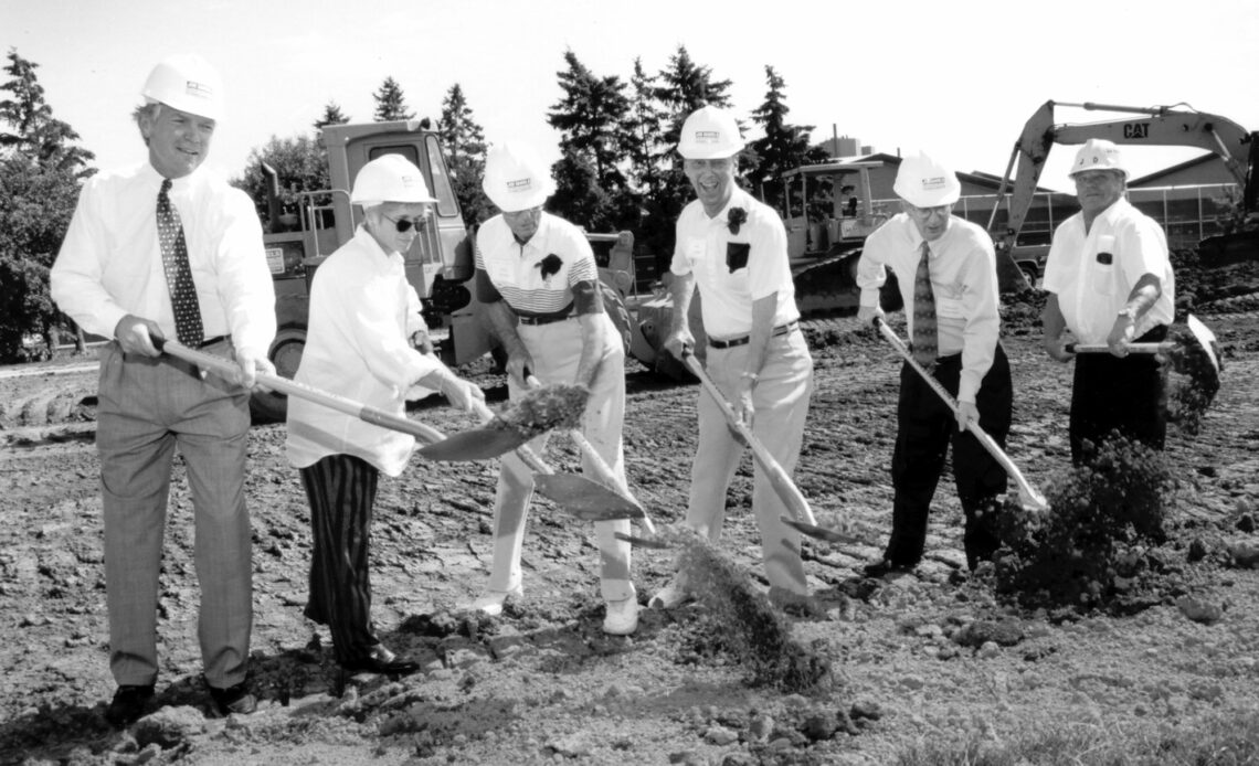Celebrating the groundbreaking of Wisconsin's Goodman Softball Complex in 1998. The Goodman brothers, longtime area softball players, businessmen and UW donors, provided the lead gift of $500,000. Named for the Madison jewelers, the original renovation project cost more than $1.2 million and has been affectionately dubbed, "Goodman Diamond."