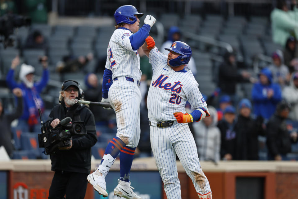 NEW YORK, NEW YORK - APRIL 4: Pete Alonso #20 of the New York Mets celebrates his game tying home run against the Detroit Tigers with Brett Baty #22 in the ninth inning of game two of a double header at Citi Field on April 4, 2024 in New York City. The Mets defeated the Tigers 2-1. (Photo by Rich Schultz/Getty Images)