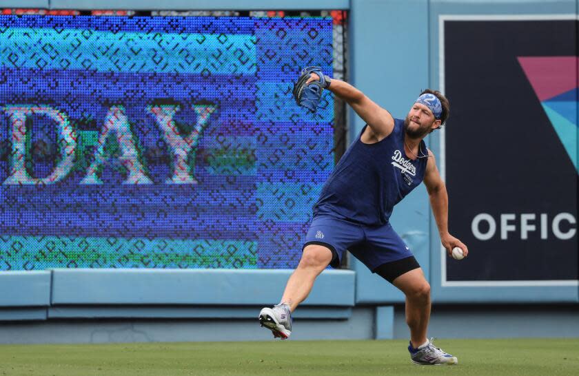 Los Angeles, CA, Sunday, June 2, 2024 - Dodgers pitcher Clayton Kershaw throws long toss while rehabbing from surgery before a game against the Colorado Rockies at Dodger Stadium. (Robert Gauthier/Los Angeles Times)