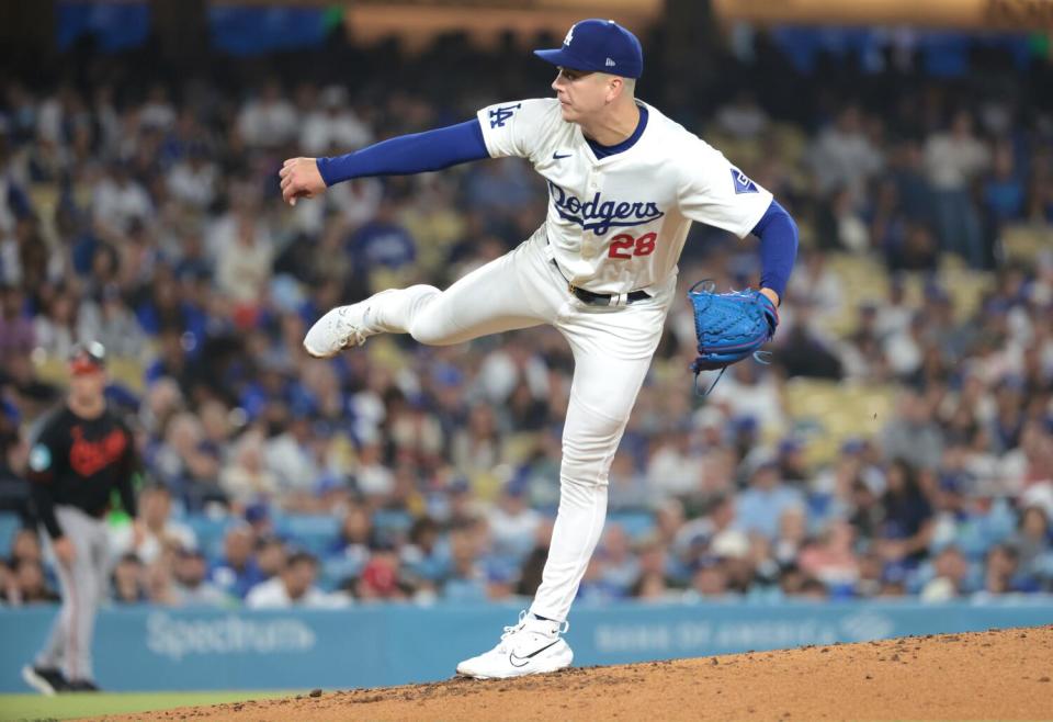 Dodgers pitcher Bobby Miller delivers against the Orioles in the fourth inning Thursday.