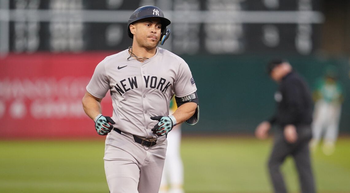 Yankees smash three home runs in 10-0 rout of A's