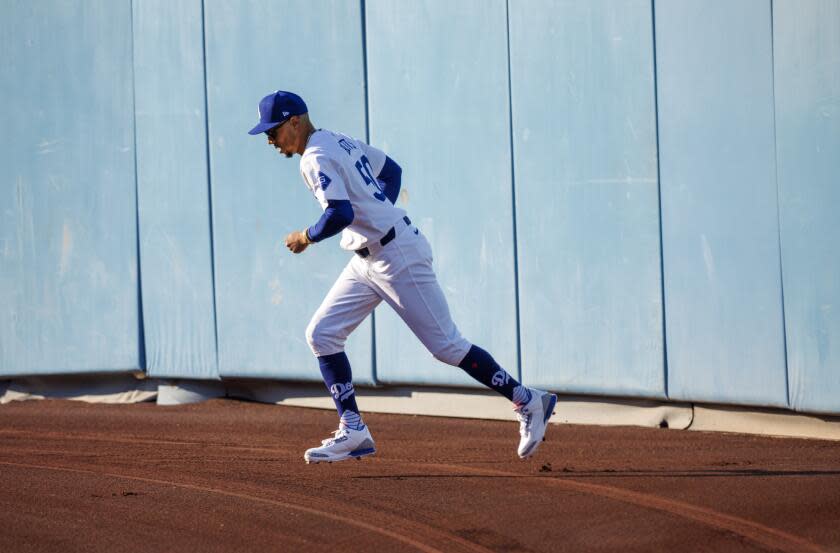 LOS ANGELS, CA - OCTOBER 6, 2024: Los Angeles Dodgers right fielder Mookie Betts (50) warms up.