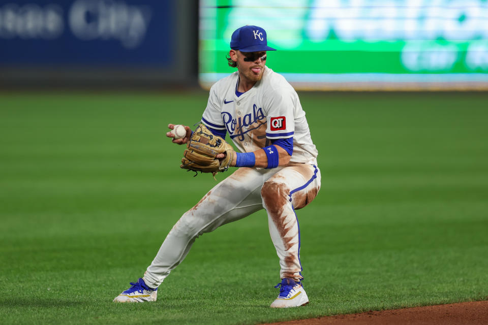 KANSAS CITY, MO - SEPTEMBER 17: Kansas City Royals shortstop Bobby Witt Jr. (7) prepares to throw to first base from the outfield grass in the fourth inning of an MLB game between the Detroit Tigers and Kansas City Royals on September 17, 2024 at Kauffman Stadium in Kansas City, MO. (Photo by Scott Winters/Icon Sportswire via Getty Images)