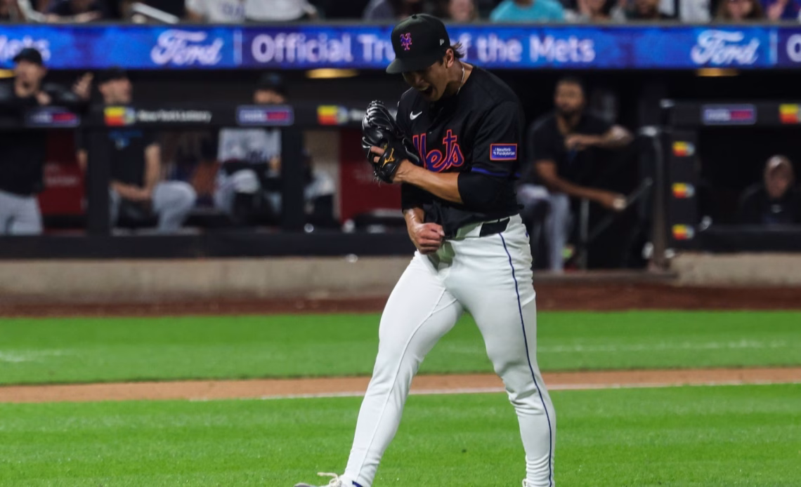 Aug 29, 2025; New York City, New York, USA; New York Mets starting pitcher Jonah Tong (21) reacts after striking out Miami Marlins catcher Liam Hicks (not pictured) to end the top of the fifth inning at Citi Field.